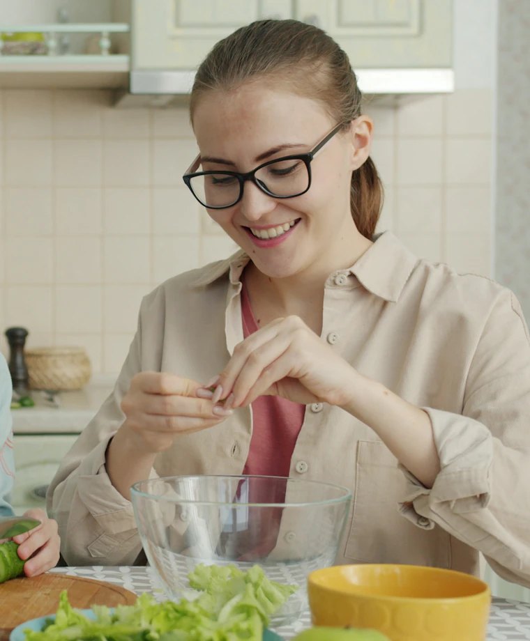 Family preparing fresh vegetables
